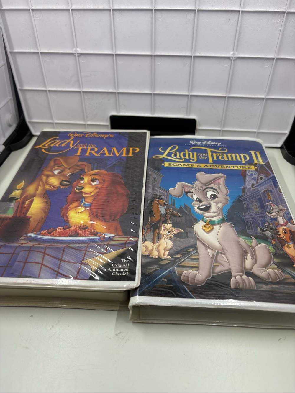 Disney Lady and the Tramp VHS Duo with Blue and Brown Cover Art